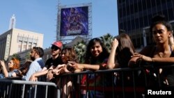 Avengers fans wait in line at the TCL Chinese Theatre in Hollywood to attend the opening screening of 'Avengers: Endgame' in Los Angeles, California, U.S., April 25, 2019. 