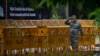An Indian paramilitary soldier stands guard next to a police barricade outside the Canadian High Commission in New Delhi, India, Tuesday, Sept. 19, 2023. 