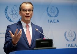 International Atomic Energy Agency acting head Cornel Feruta addresses the media during a board of governors meeting at the IAEA headquarters in Vienna, Sept. 9, 2019.