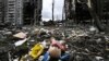 A children's toy near an apartment building destroyed during Russia's large-scale war against Ukraine. The city of Borodyanka, Kyiv region, April 6, 2022. (Genya Savilov/AFP)