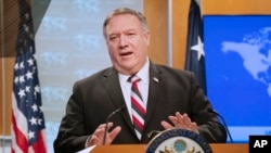 FILE - Secretary of State Mike Pompeo speaks during a news conference at the State Department, March 17, 2020, in Washington. 