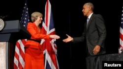 Britain's Prime Minister Theresa May (L) and U.S. President Barack Obama shake hands after speaking to reporters following their bilateral meeting alongside the G20 Summit, in Ming Yuan Hall at Westlake Statehouse in Hangzhou, China, September 4, 2016.