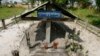 Incense stick holders stand at the cremation site of late Khmer Rouge leader Pol Pot in Anlong Veng, a former Khmer Rouge stronghold, about 305 kilometers (190 miles) north of Phnom Penh, Friday, April 11, 2008. (AP Photo/Heng Sinith)