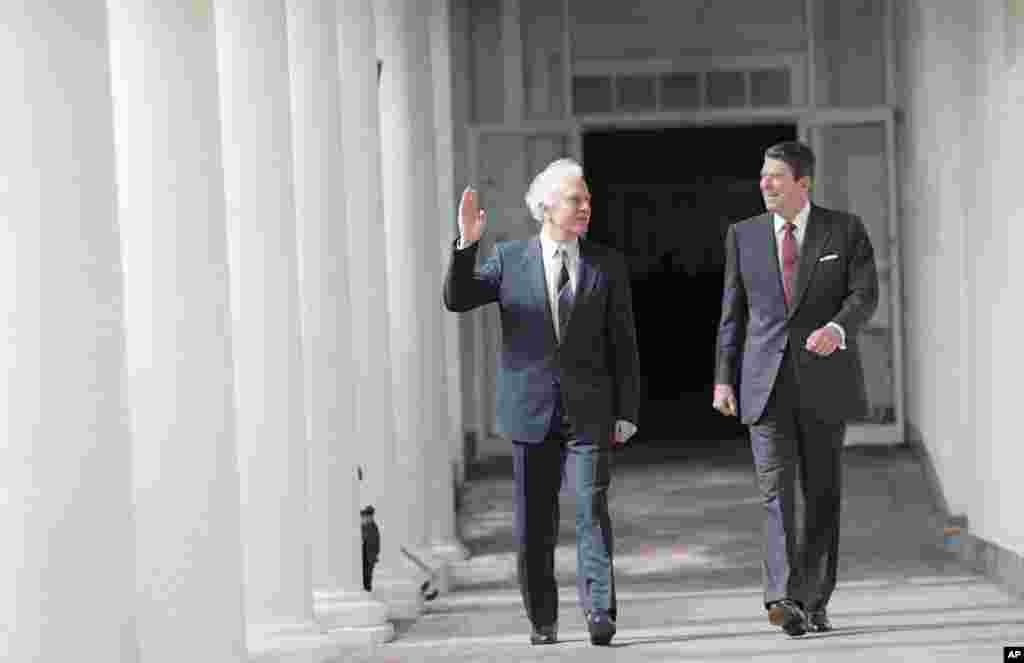 A smiling President Ronald Reagan and Soviet Foreign Minister Eduard Shevardnadze walk from the Oval Office in the White House, Sept. 27, 1985.