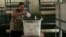 An Egyptian man casts his vote at a polling station in Cairo, Egypt, on May 28, 2014. 