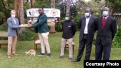 Members of Golf Zimbabwe visited Scott Vincent's father (far left) in Harare on Thursday. (Photo: Zimbabwe Olympics Committee)