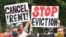 Demonstrators in Brooklyn, New York, attend an Aug. 19, 2021, rally calling for an extension of the state's eviction ban until 2022 and the cancellation of rent.