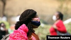 A woman wears a face mask as protection against COVID-19 in Abuja, Nigeria, Feb. 2, 2021.