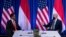 President of Indonesia Joko Widodo, left, listens as U.S. President Joe Biden makes a statement for the press before a bilateral meeting at the COP26 UN Climate Change Conference in Glasgow, Scotland, on Nov. 1, 2021.