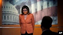 Speaker of the House Nancy Pelosi, D-Calif., meets with reporters at the Capitol in Washington, Oct. 8, 2020.