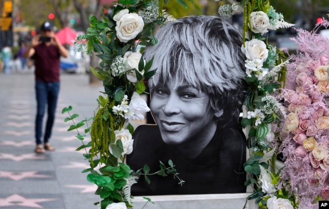 A portrait of the late singer Tina Turner stands atop her star on the Hollywood Walk of Fame, Wednesday, May 24, 2023, in Los Angeles. Turner died Tuesday at 83 after a long illness. (AP Photo/Chris Pizzello)