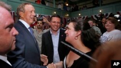 Former New York Gov. George Pataki greets supporters in Exeter, New Hampshire, after announcing his plans to seek the Republican nomination for president, May 28, 2015.
