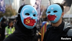 香港抗议者举行示威集会支持新疆维吾尔穆斯林人权。（2019年12月22日）