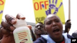 AIDS activists and people living with HIV march to the European Union's office in Nairobi, Kenya Dec. 9, 2010