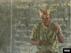 A Cameroonian soldier offers instruction at the government school in Fotokol, May 11, 2018. (M. Kindzeka/VOA)