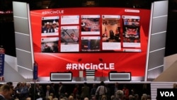 Social media posts are on display at the Republican National Convention, July 18, 2016.