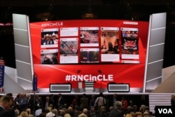 Social media posts are on display at the Republican National Convention, July 18, 2016.