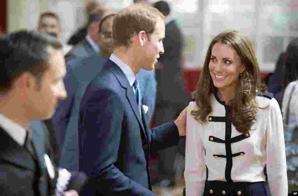 Britain's Prince William and Catherine the Duchess of Cambridge visit the Summerfield Community Centre, in the Winson Green area of Birmingham, August 19, 2011. Prince William and Catherine visited areas affected by last week's violent disturbances in Bir
