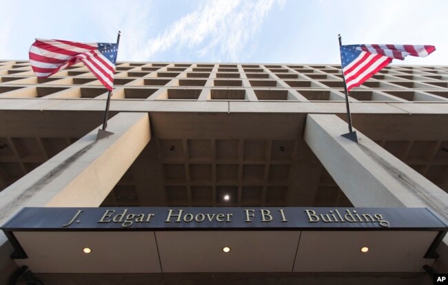 The Pennsylvania Avenue entrance of the J. Edgar Hoover Federal Bureau of Investigations (FBI) Building is seen in Washington, Nov. 30, 2017.