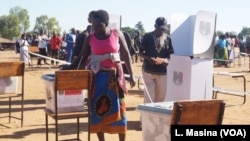 Malawians cast ballots May 21 in presidential and parliamentary elections. The results of the presidential vote must wait until about a third of the ballots are recounted.