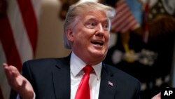 President Donald Trump speaks during a cabinet meeting at the White House, in Washington, Jan. 2, 2019.