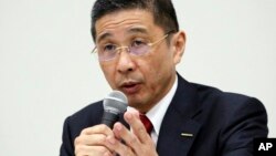 Nissan Motor Co. Chief Executive Hiroto Saikawa speaks during a press conference in Yokohama, near Tokyo, Dec. 17, 2018. 