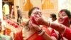 Women Smear Each Other With Vermillion to Culminate Durga Puja in India