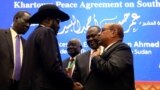 FILE - South Sudan President Salva Kiir, Sudan's President Omar Al-Bashir and South Sudan rebel leader Riek Machar are seen after peace talks in Khartoum, Sudan, June 27, 2018.