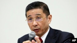 Nissan Motor Co. Chief Executive Hiroto Saikawa speaks during a press conference in Yokohama, near Tokyo, Dec. 17, 2018. 