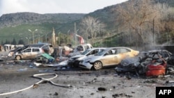 Remains of cars Feb. 11, 2013 at border between Turkey and Syria in Hatay, Turkey (ANADOLU AGENCY / CEM GENCO)