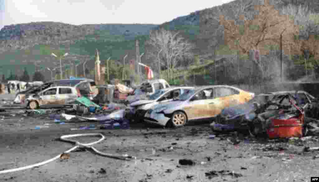 Remains of cars Feb. 11, 2013 at border between Turkey and Syria in Hatay, Turkey (ANADOLU AGENCY / CEM GENCO)