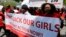 Protesters march in support of the girls kidnapped by members of Boko Haram in front of the Nigerian Embassy in Washington, D.C., May 6, 2014.