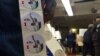 "I voted" stickers are given to people after turning in their ballots to election officials at the 2nd Canaan Baptist Church in Central Harlem, New York, April 19, 2016. (R. Taylor / VOA) 