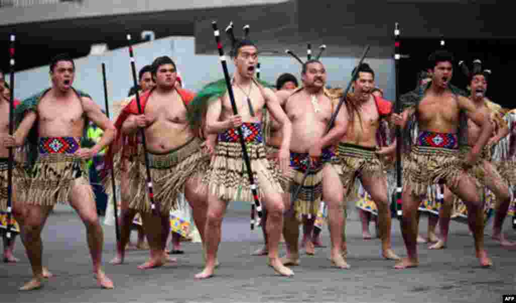 Dancers put on a traditional Maori welcoming ceremony for U.S. Secretary of State Hillary Rodham Clinton after arriving at the Parliament Complex Thursday, Nov. 4, 2010 in Wellington, New Zealand. (AP Photo/Evan Vucci)