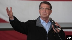 FILE - Defense Secretary Ash Carter, shown speaking to U.S troops at the Incirlik Air Base near Adana, Turkey, Dec. 15, 2015, told members of the 101st Airborne Division that Islamic State "is a cancer that's threatening to spread."