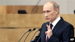 Russia's Prime Minister Vladimir Putin addresses the parliament in Moscow, April 20, 2011