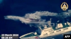 A video released by the Armed Forces of the Philippines on March 23, 2024 shows in the lower right corner a vessel they call a Chinese Coast Guard vessel using high-pressure water cannon to attack a civilian vessel chartered by the Philippine military near Second Thomas Shoal in the South China Sea.