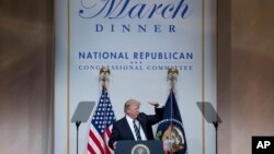 Le président Donald Trump lors d’un dîner du comité national républicain, à Washington, 21 mars 2017.