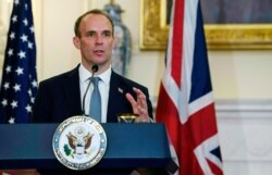 FILE - British Foreign Secretary Dominic Raab speaks at a press conference at the State Department in Washington, Sept. 16, 2020.