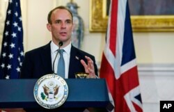 British Foreign Secretary Dominic Raab speaks at a press conference with Secretary of State Mike Pompeo at the State Department, Sept. 16, 2020, in Washington.
