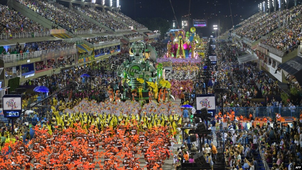 Members of the Sao Clemente samba school perform during the second night of Rio's Carnival parade at the Sambadrome in Rio de Janeiro, Brazil, March 4, 2019. 