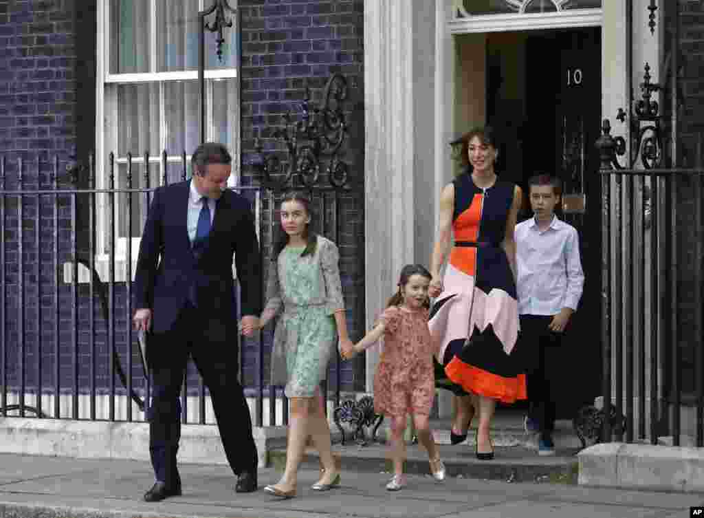 Prime Minister David Cameron, his wife Samantha and their children Nancy, Florence and Elwen, from left, leave 10 Downing Street, in London. Cameron formally resigned during a meeting with Queen Elizabeth II at Buckingham Palace.