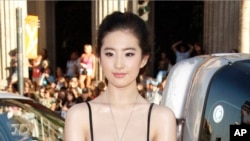 FILE - Actress Yifei Liu arrives at the "Hancock" premiere in Los Angeles, June 30, 2008. 