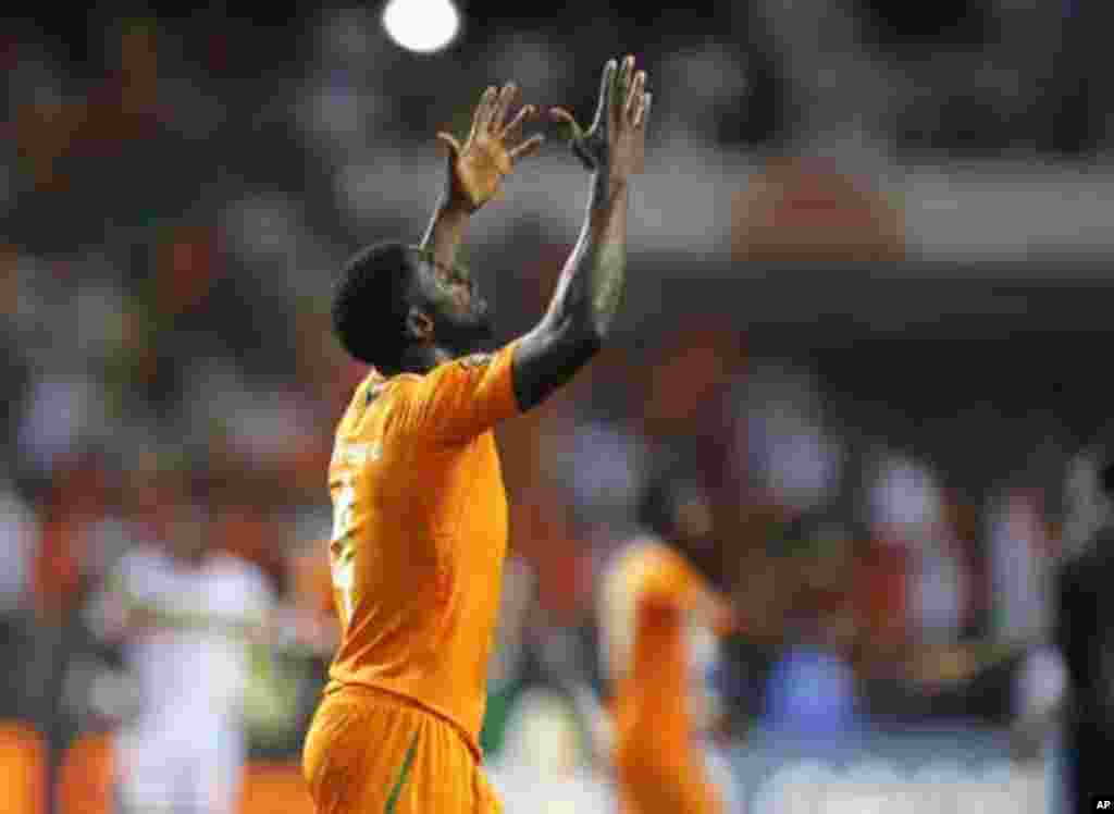 Ivory Coast's Kolo Abib Toure celebrates after they won their African Nations Cup semi-final soccer match against Mali at the Stade De L'Amitie Stadium in Gabon's capital Libreville February 8, 2012.