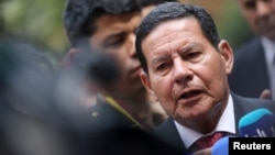 Brazil's Vice President Hamilton Mourao speaks to the media after a meeting of the Lima Group in Bogota, Colombia, Feb. 25, 2019.