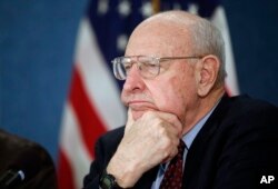 Former ambassador Thomas R. Pickering, listens during a news conference to unveil the 'Doomsday Clock' that remained at three minutes to midnight, by Bulletin of the Atomic Scientists, Jan. 26, 2016 in Washington.