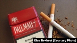 FILE - Pall Mall cigarettes are arranged for a photo in Washington, DC. (Photo: Diaa Bekheet). The World Health Organization said, April 15, 2021, that raising taxes on cigarettes and other tobacco products is the smartest and best way to save lives.