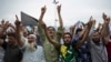 Kashmiri Muslims shout pro-freedom slogans during a demonstration after Friday prayers amid curfew-like restrictions in Srinagar, India, Aug. 16, 2019. 