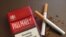 FILE - Pall Mall cigarettes are arranged for a photo in Washington, DC. (Photo: Diaa Bekheet). The World Health Organization said, April 15, 2021, that raising taxes on cigarettes and other tobacco products is the smartest and best way to save lives.