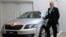 FILE - Skoda Chairman Winfried Vahland poses with a new Skoda Octavia car in this March 20, 2013 photo. 